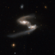 Illustration for article titled The Cosmic Wonder of Colliding Galaxies